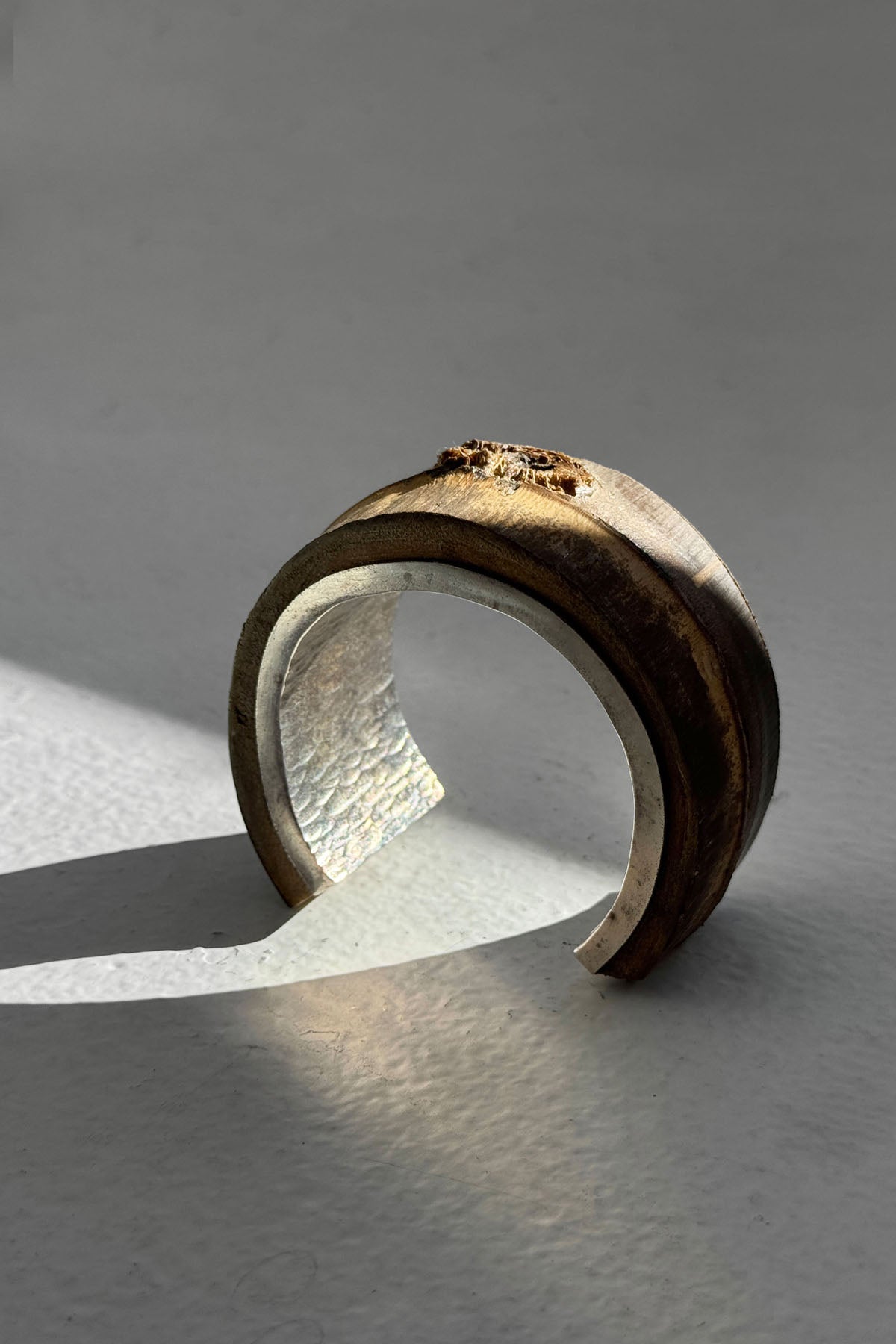 SILVER AND WOOD BANGLE
